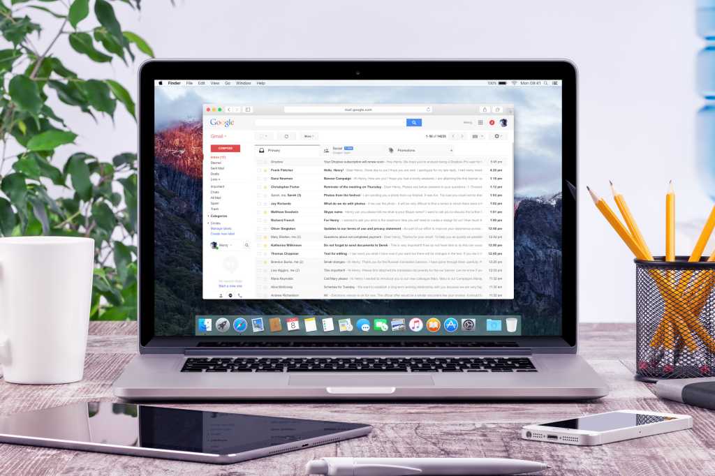 Gmail in a web browser on the screen of a Macbook Pro laptop hero