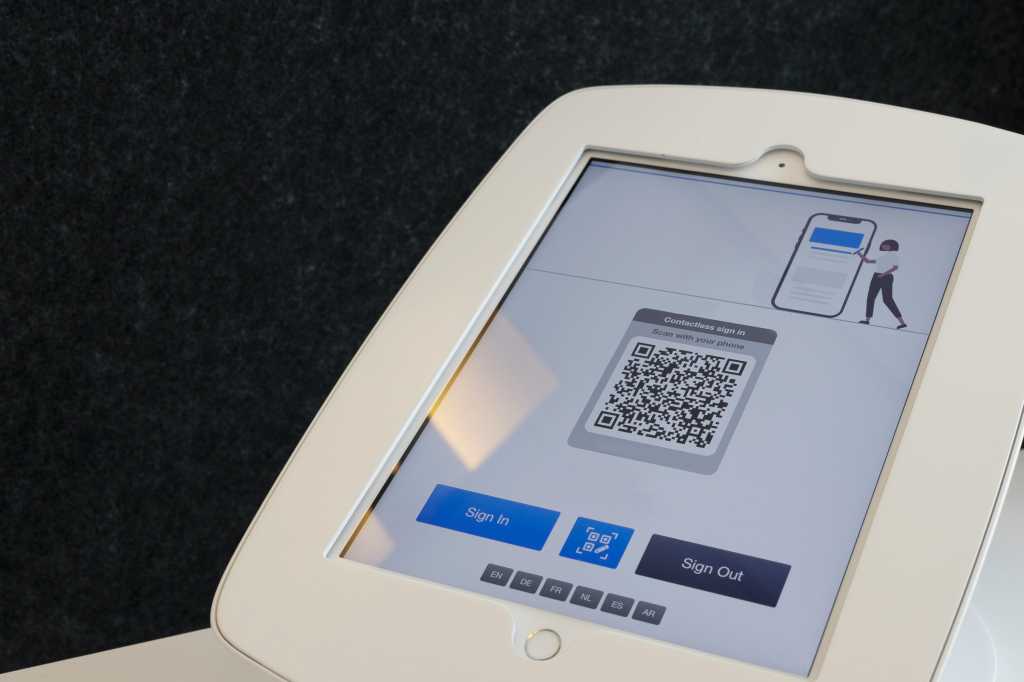 A QR code for sign-in on a tablet-based kiosk