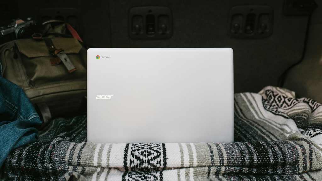 Acer Chromebook on a blanket in bed