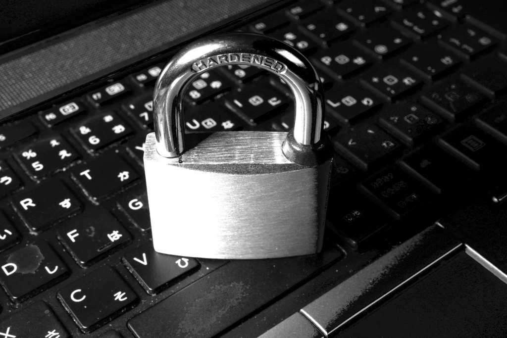 Padlock on a laptop keyboard