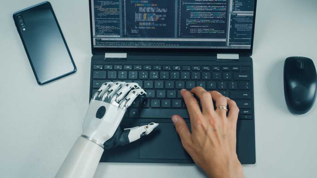 AI vibe coding one hand is robot one hand is human