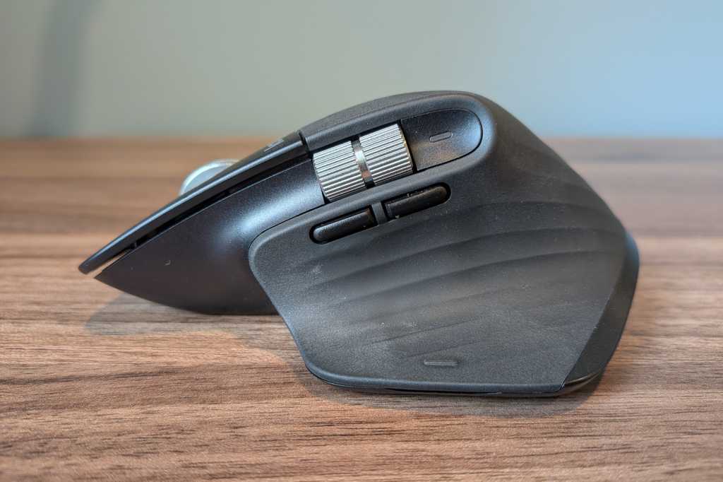 Side view of a Logitech MX Master 3S with two buttons and a scroll wheel.