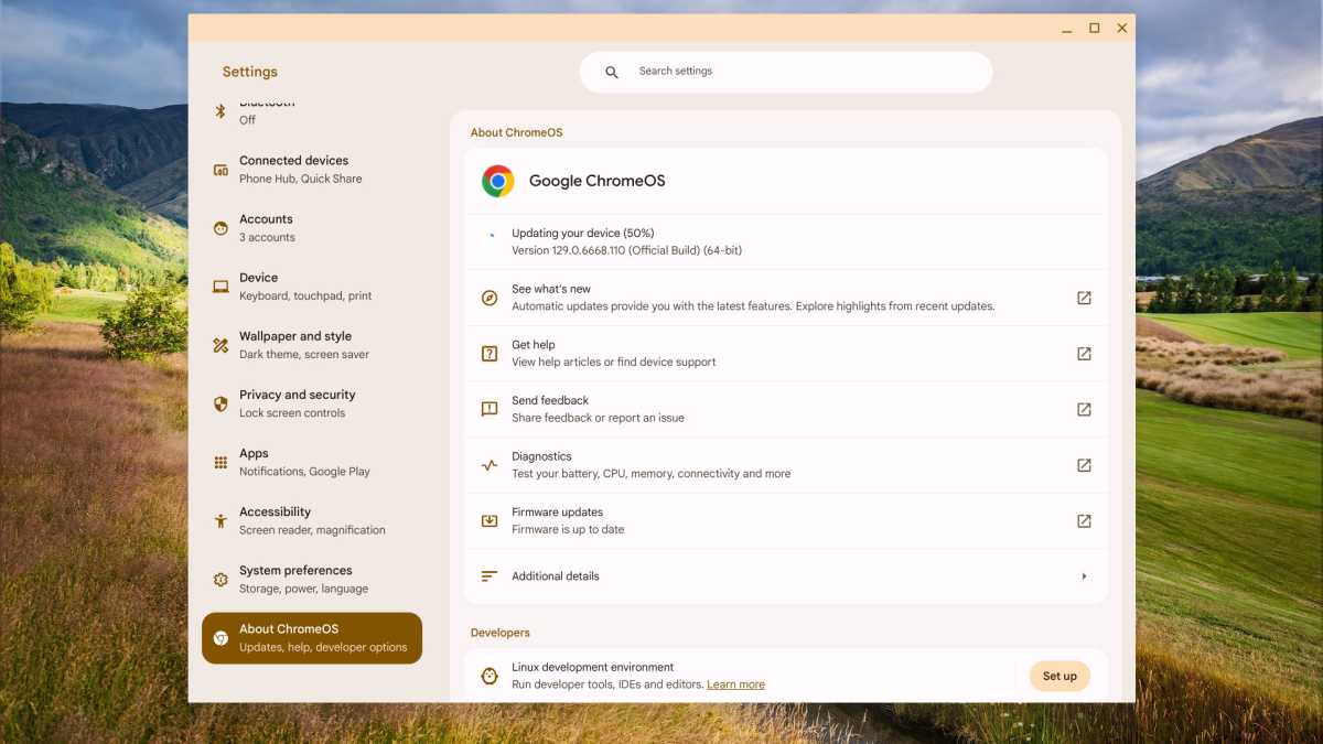 Capture d'écran des paramètres ChromeOS affichant la mise à jour du système en cours