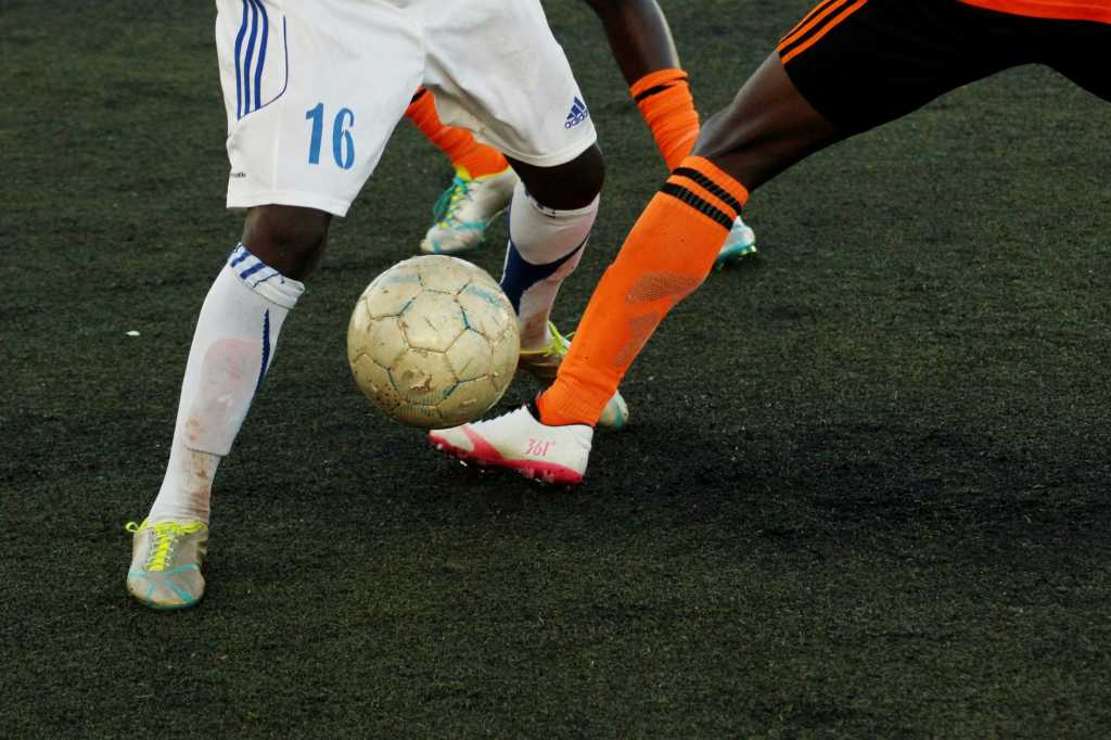 two players with a soccer ball