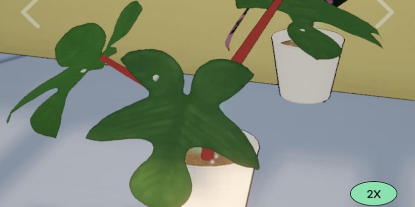 Gros plan d'une plante avec des parasites blancs rampant sur ses feuilles vertes