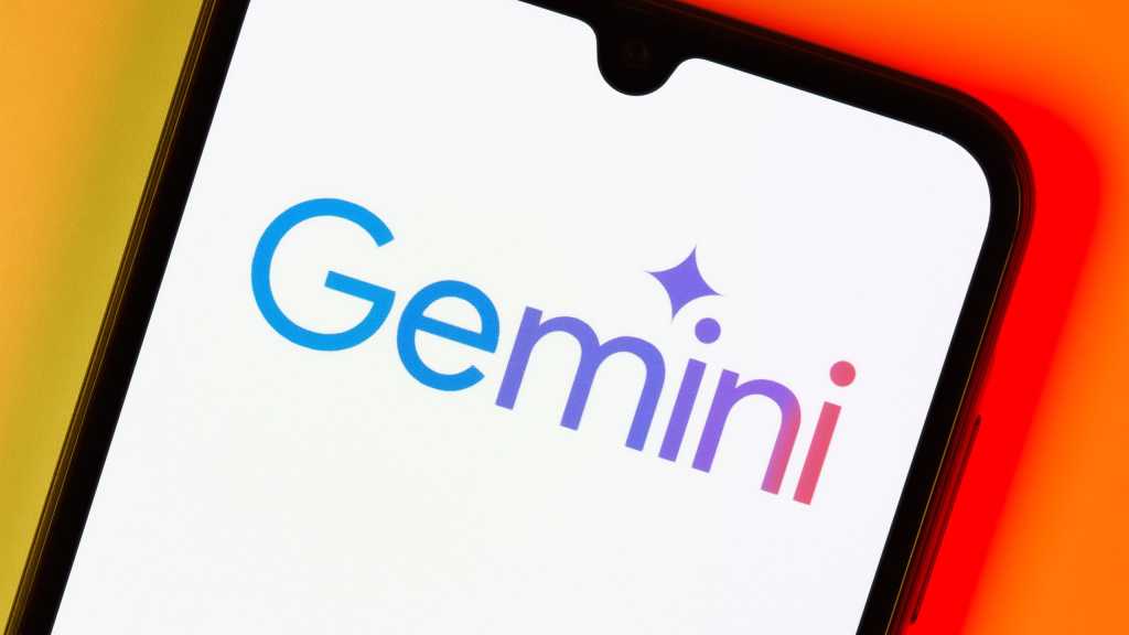 Smartphone auf der Oberfläche mit Google Gemini Logo