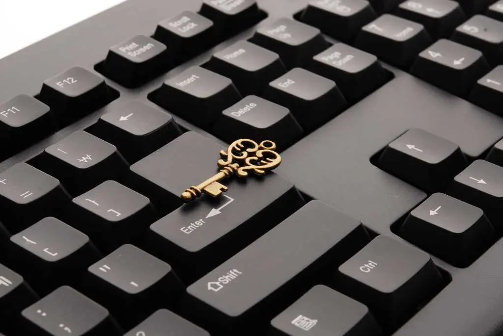 Physical metal key on top of a keyboard