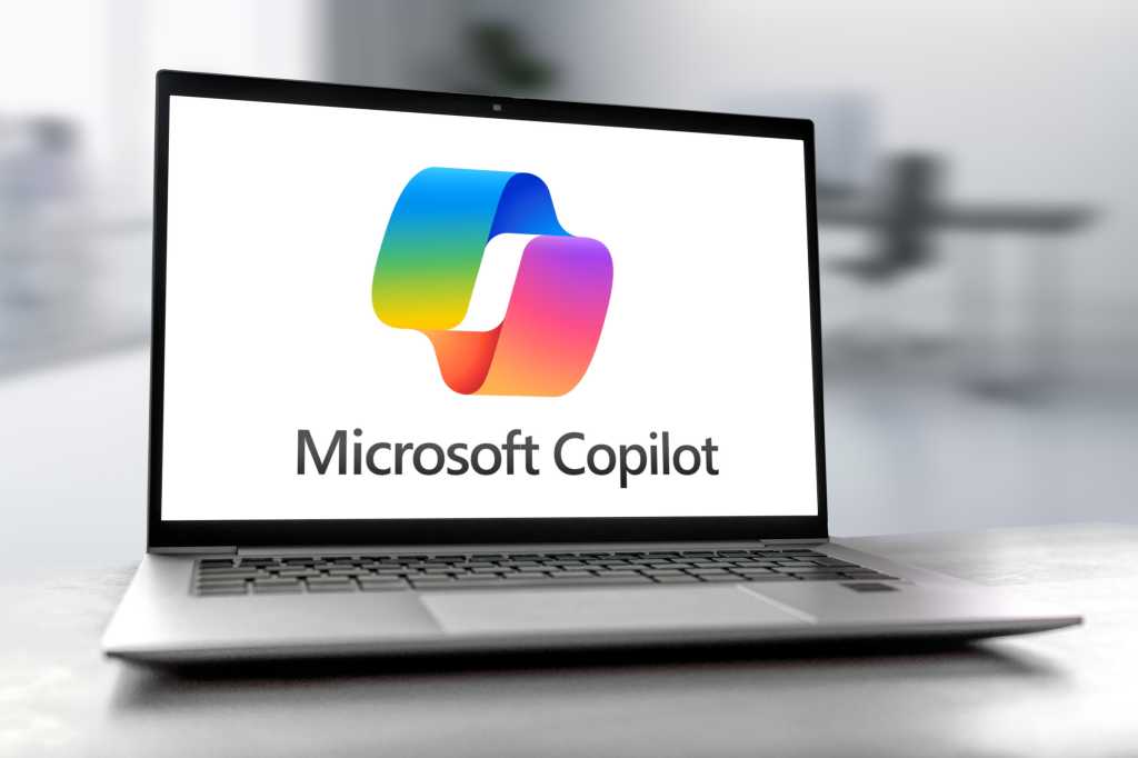 Microsoft Copilot logo on open laptop screen
