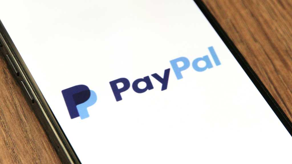 PayPal logo on phone screen closeup