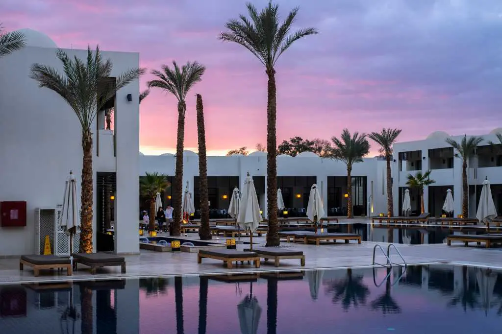 Hotel resort with white buildings during sunset