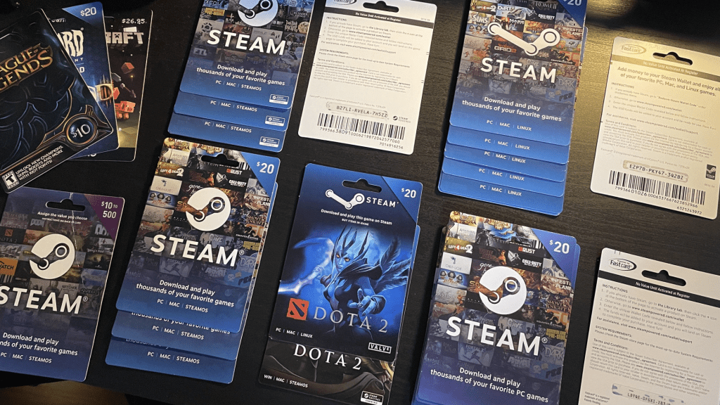 Steam gift cards on a table