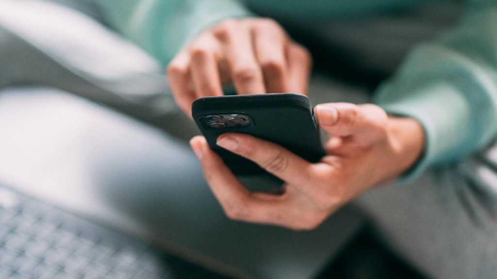 person using phone iphone smartphone