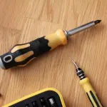 Magnetic screwdriver set on a wood floor