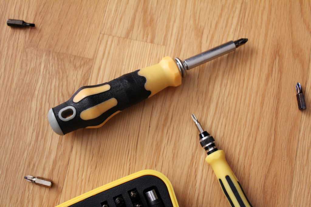 Magnetic screwdriver set on a wood floor