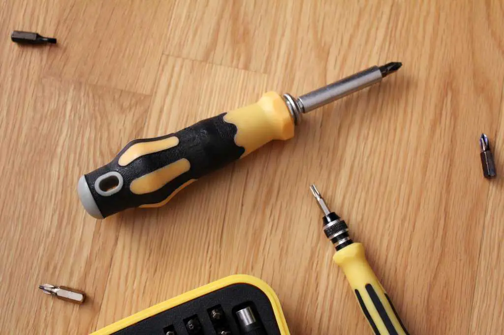 Magnetic screwdriver set on a wood floor